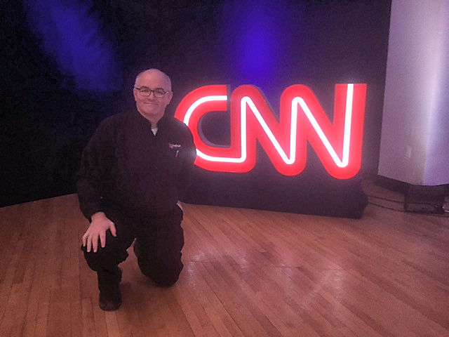 TJ at CNN sign