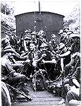 Borneo in the 1950's.
SAS troopers of D Squadron, 21 SAS returning from a patrol in the relative comfort of a freight train flatcar. Note that each soldier's weapon is the venerable M1 Carbine. 