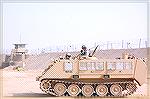 USAF M113 "Armored Personnel Carrier," Camp Bucca, Iraq.  The M113 is many decades out of date, and while the USAF has up-armored HumVees (next photo) and other vehicles on the TOE, the M113 continues