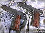 My two Springfield Range Officer pistols, .45ACP and 9mm.  These are the original, Parkerized, five inch models with LPA sights, not any of the later models made after the originals sold like crazy an