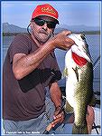 Tony Mandile with a 9-lb. bass caught on a Pop-R at Mexico's Lake El Salto. 