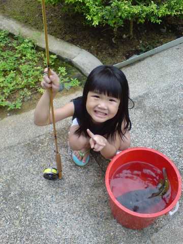 Maegan with Peacocks in Pail