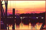The fleet in port against a colorful sunset.

Copyright 1999 by Mike Plaia. No reproduction without permission.

