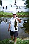Nice fly caught bass from a shallow canal in my backyard, Margate Florida  

