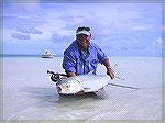 Us-Fly's guide Arno after landing a 26lbs Milkfish on a fly.US-Fly's MilkiesUS-Fly