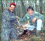 I was sorting through some slides and came across this one that brought back a few memories. It's "Ernest" (the late Jim Varney), me and my little Alabama buck. 