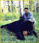 Tony Mandile and his 8''6" black bear, killed near Prince George, BC. A 225-gr. bullet out of a .338 did the job. 