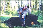 Tony Mandile with his two black bears killed near Prince George, BC. The largest on the right was 8''6" long and the one on the left was 7''3" long. Both were shot with a 225-gr. bullet out of a Brown