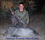 Christopher Clerc and the javelina he harvested on February 27, 2002 using his .223 rifle.Peeg SuccessMike Clerc