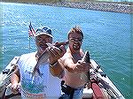 This is a photo of Marty and I. It was taken Sept. 12th 2003, on our annual catfishing trip below the Fort Randall Dam. The catfish are non-stop with each pass in the fast water! It is not uncommon to