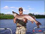 Bill O'Halloran, North Country River Charters with a monster Northern Pike, caught  in Alaska on the Yukon River. 

 www.ncrc.alaska.com

