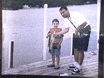 6 year old Josh with his first ever 3.5 pound Largemouth. Caught on a Mepps inline spinner bait on a snoopy rod July 2004