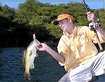 Joel Tomkins, PR rep for Plano, showing off a nice 6-lb. largemouth bass caught at Lake El Salto on a popper while staying at Billy Chapman's Angler's Inn.