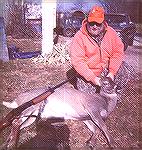 I took this doe in 2000, I believe, just acrossed the street from my home in the woods where I hunt. It was the first day of the season about 9 or 10 in the morning. She just walked through the field 