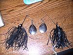 Pair of Black 1/4 oz Spinnerbaits. Right is a bait with nylon skirt 30 some odd years old and the one on the left is todays silicon skirt.