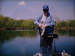 Little Bass that never hung from the Boga Grip scale. Caught on a 5" Black with Blue flake, Senko worm.