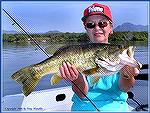 Ellen Mandile with a fat and sassy 8-lb. bass from Mexico's Lake El Salto. 