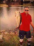 My buddy Larry Goggins caught on Live bait (Goldfish). He did not have a scale to weight her but she measured 21".