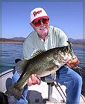 Dr. John Belden with his Lake Bacarrac bass that  weighed 10 lbs., 12 oz. It bit a 7" watermelon YUM lizard fished on a Carolina rig.