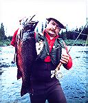 Angler with an eight-pound trophy brook trout caught in the Little Minipi watershed area of Labrador.